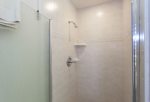 The guest bathroom features a full shower